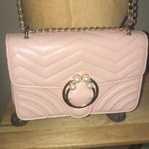 ,NWOT pink and pearl crossbody hand made bag.